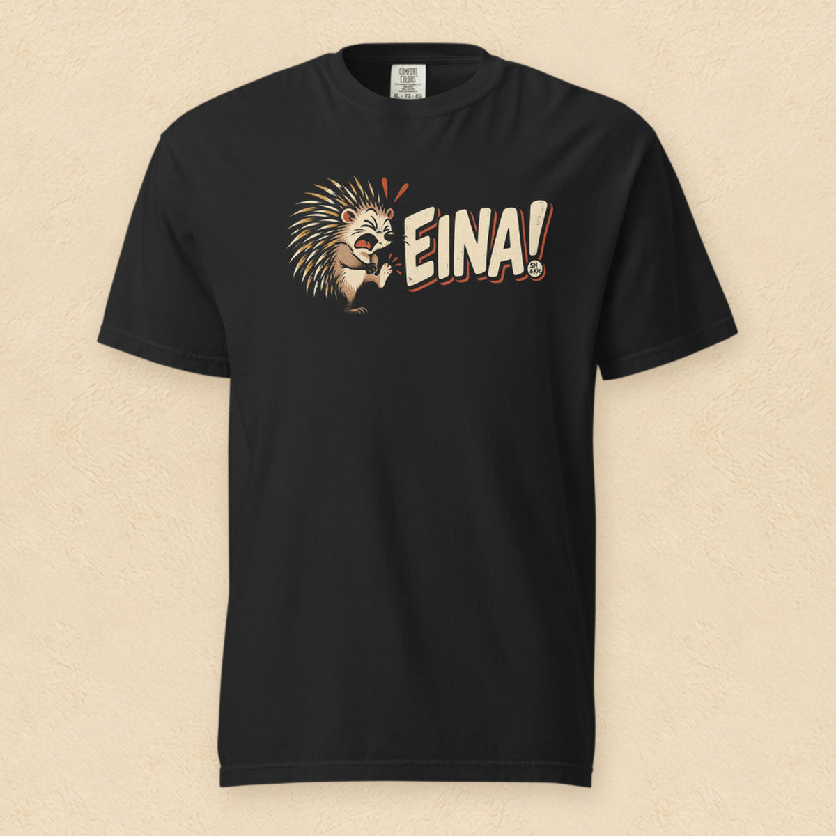 Eina! — Black shirt on cream wall