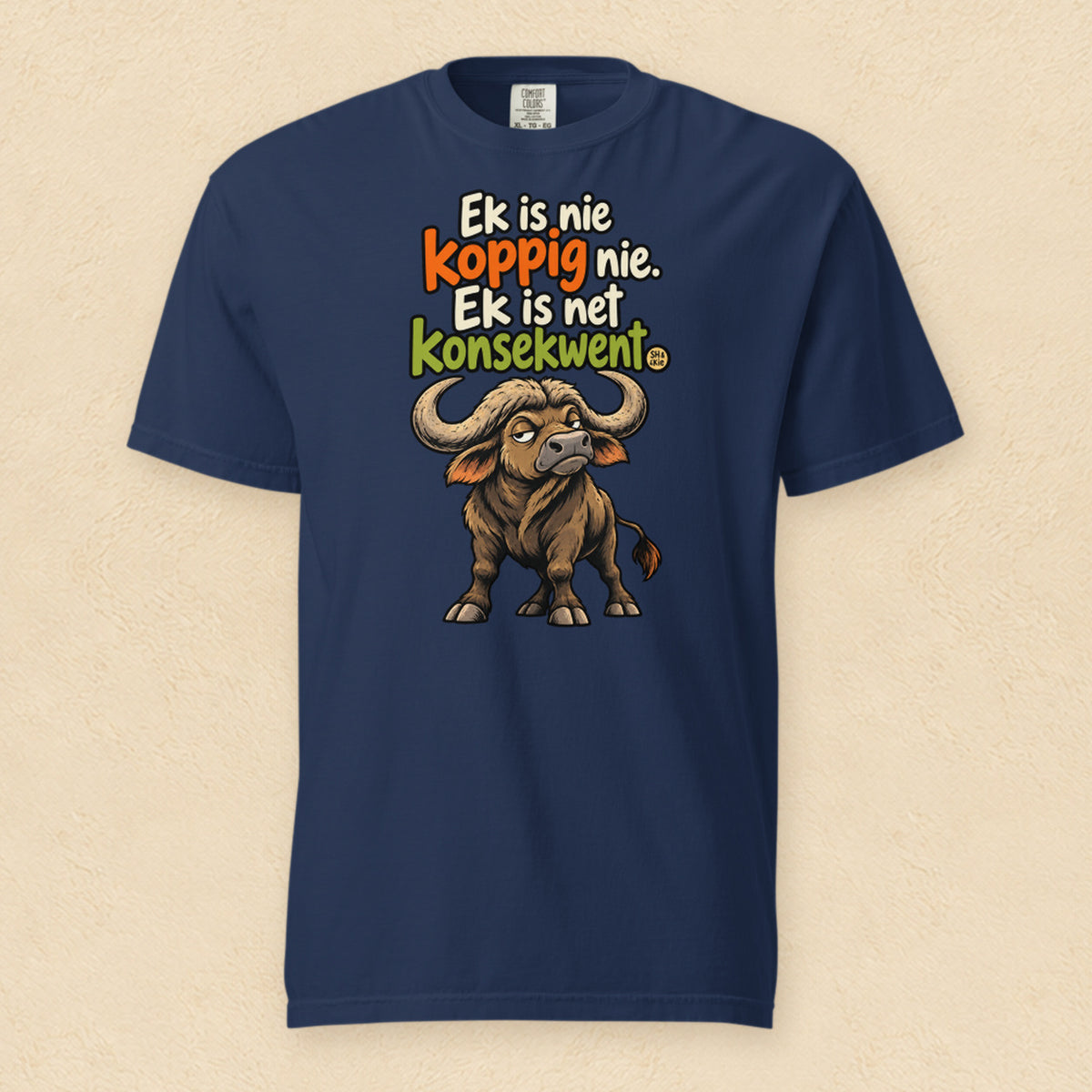 Ek is nie koppig nie. Ek is net konsekwent — True Navy shirt on cream wall
