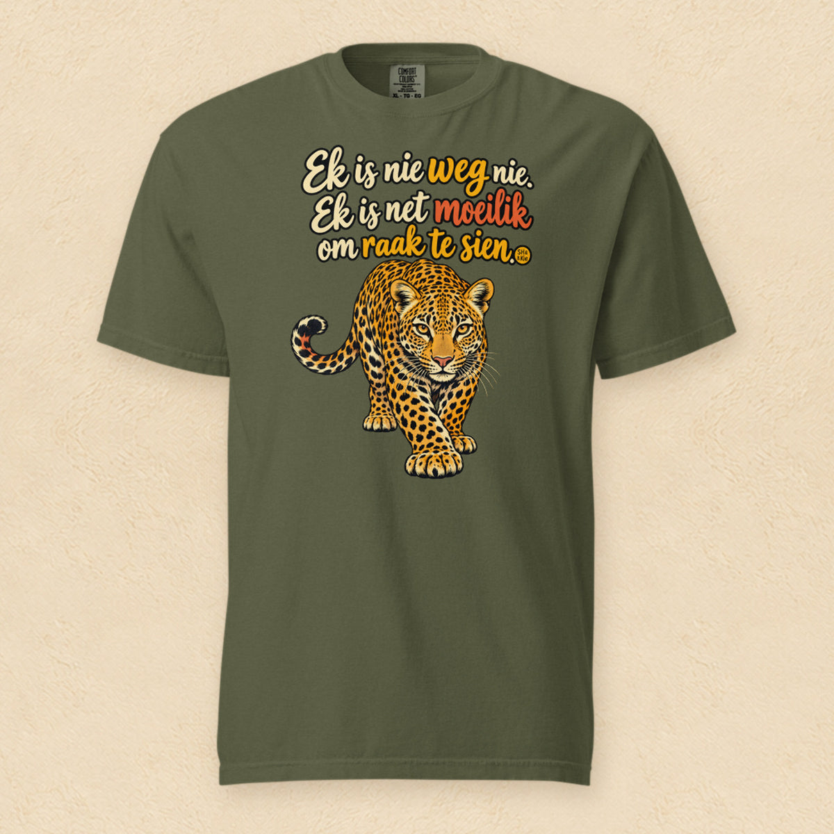 Ek is nie weg nie. Ek is net moeilik om raak te sien — Hemp shirt on cream wall