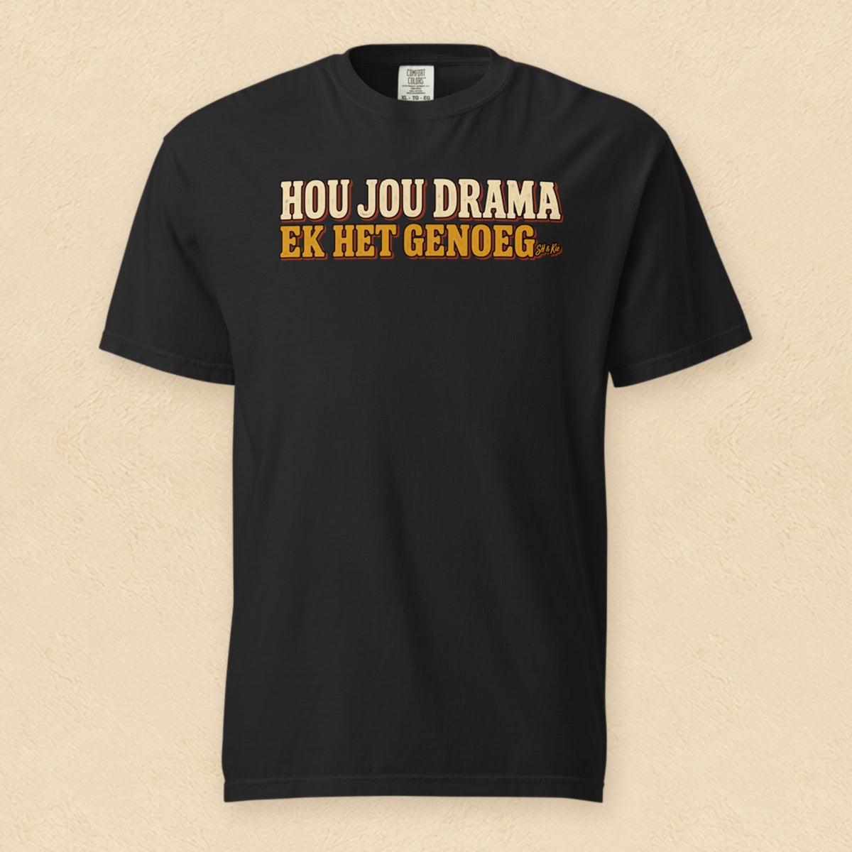 Hou jou drama, ek het genoeg — Black shirt on cream wall