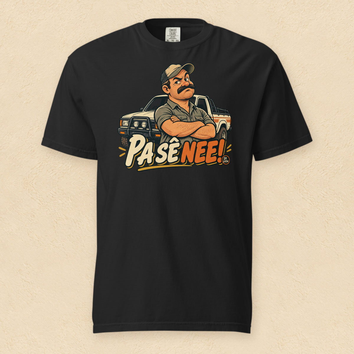 Pa sê nee! — Black shirt on cream wall