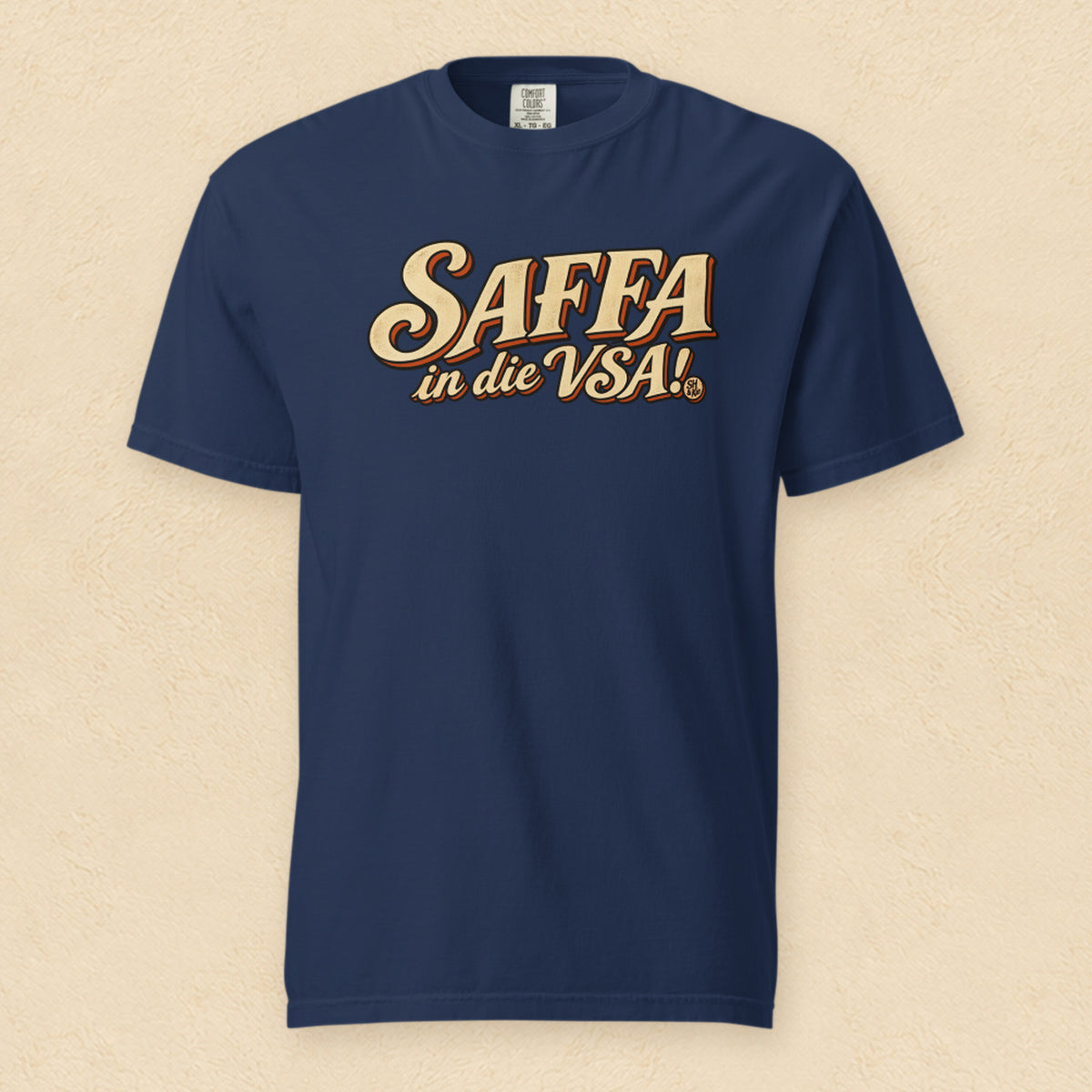 Saffa in die VSA! (Klassiek) — True Navy shirt on cream wall