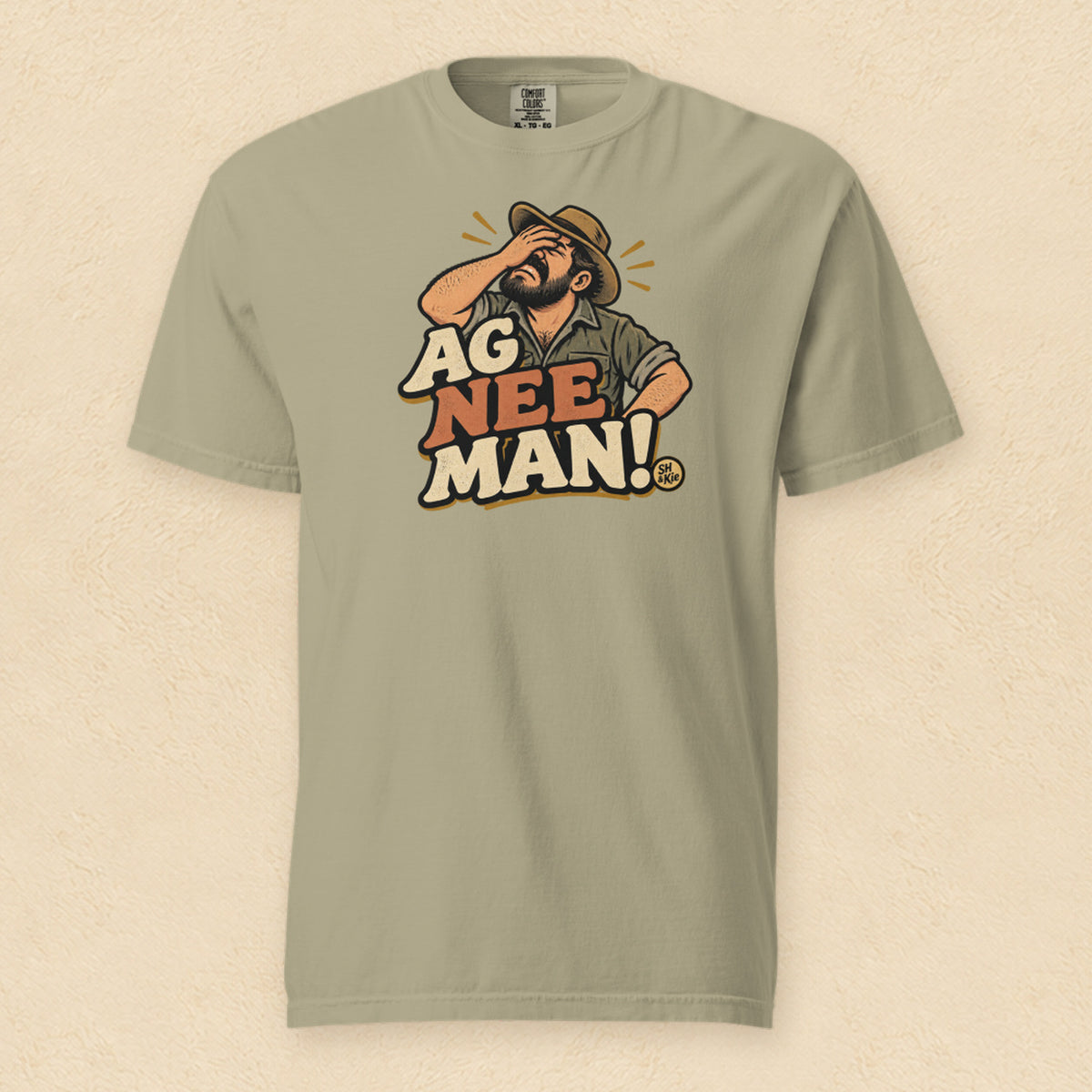 Ag nee man! — Khaki shirt on cream wall